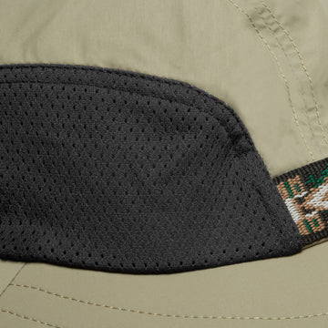 A studio photo showing the crown mesh on the Adventure Hat